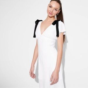 NWT wild fable White Dress with Black Accents bows on shoulder. Flutter sleeve M
